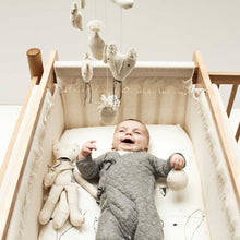 Baby with Acorn rattle  Severina kids + Krethaus